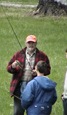 Mr. Pitcock showing me how to release a catch