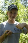 Tim holding a snake we found.