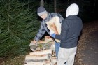 Michael helping to stack the wood
