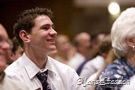 Alex listens closely to to Tom Harmon's message