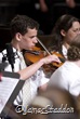Jonathan and Esther playing in the orchestra