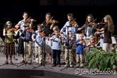The Duggars play their violins for special music
