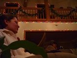 Reading a good Christmas story while decorating the tree. 