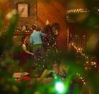 Daniel and Esther decorating the tree.