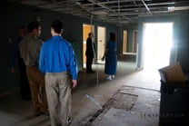 Touring a section of the building still under construction