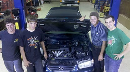Dwayne, Dale, Andrew, and I with the new engine installed!