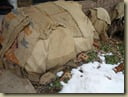 Burlap insulation - the "usual method" - completely covered with burlap over a wire support (2010)