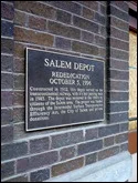 This plaque is posted on the south side, visible from the rail trail.
