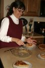 {2thanks06} Mom dishes out the homemade pumpkin pie